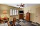 Bedroom featuring plantation shutters, ceiling fan and stylish decor at 9912 Woodhouse Dr, Las Vegas, NV 89134