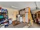 This utility room features a washer, dryer and storage cabinets at 9912 Woodhouse Dr, Las Vegas, NV 89134