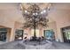 Stunning lobby features a unique tree sculpture, skylights, and elegant architectural details at 9912 Woodhouse Dr, Las Vegas, NV 89134
