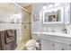 Well-lit bathroom features a glass-enclosed shower and modern vanity at 1001 Sulphur Springs Ln # 202, Las Vegas, NV 89128