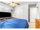 Bedroom with a ceiling fan, closet, and neutral decor at 1001 Sulphur Springs Ln # 202, Las Vegas, NV 89128