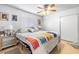 Comfortable bedroom with a ceiling fan, closet, and natural light from the window at 1001 Sulphur Springs Ln # 202, Las Vegas, NV 89128