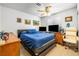 Bedroom featuring a ceiling fan and a large window for natural light at 1001 Sulphur Springs Ln # 202, Las Vegas, NV 89128