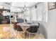 Charming dining area with a chandelier, tiled floors, and a view into the adjacent living space at 1001 Sulphur Springs Ln # 202, Las Vegas, NV 89128