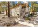 Charming condo featuring well-maintained landscaping, a private entrance, and stucco siding at 1001 Sulphur Springs Ln # 202, Las Vegas, NV 89128