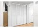 Clean hallway featuring a large closet with bi-fold doors, and a neutral color scheme at 1001 Sulphur Springs Ln # 202, Las Vegas, NV 89128