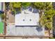 Aerial shot of the house showing the expansive roof and shaded parking area for multiple vehicles at 10445 Schirlls St, Las Vegas, NV 89141