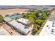 An aerial view of the property with tennis court and pool at 10445 Schirlls St, Las Vegas, NV 89141