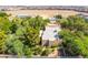 An aerial view of the backyard featuring mature trees and privacy at 10445 Schirlls St, Las Vegas, NV 89141