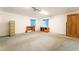 The carpeted bonus room includes a wooden desk and filing cabinet at 10445 Schirlls St, Las Vegas, NV 89141