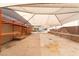A carport with awning and ample space for parking at 10445 Schirlls St, Las Vegas, NV 89141