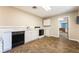 A traditional style kitchen with white cabinets and laminate countertops and flooring at 10445 Schirlls St, Las Vegas, NV 89141