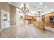 Wide shot of kitchen with stainless steel appliances and custom cabinetry at 10445 Schirlls St, Las Vegas, NV 89141