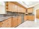 Granite countertops and modern appliances in this well-appointed kitchen space at 10445 Schirlls St, Las Vegas, NV 89141