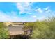 Lush, mature landscaping surrounding the property, offering beauty and privacy at 10445 Schirlls St, Las Vegas, NV 89141