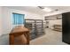 Versatile room with shelves and a large window, ready for your personal touch at 10445 Schirlls St, Las Vegas, NV 89141