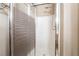 Shower with frosted glass door and metal fixtures, perfect for rinsing off in a private space at 10445 Schirlls St, Las Vegas, NV 89141