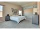 Bright bedroom featuring neutral walls, plush carpet, and contemporary decor for a serene atmosphere at 1048 Menands Ave, Las Vegas, NV 89123