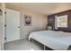 This bedroom has a white door and a window at 1048 Menands Ave, Las Vegas, NV 89123