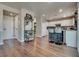 Spacious kitchen area with an island, open floor plan, and ample natural light at 1048 Menands Ave, Las Vegas, NV 89123