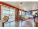 Bright living room with patio access, stylish furnishings, and a relaxed ambiance at 1048 Menands Ave, Las Vegas, NV 89123