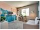 Bright living room with comfortable seating, perfect for lounging and entertaining at 1048 Menands Ave, Las Vegas, NV 89123