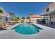 Inviting backyard oasis with a sparkling pool, patio, and comfortable seating area perfect for outdoor enjoyment and relaxation at 1048 Menands Ave, Las Vegas, NV 89123