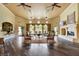 Clubhouse with hard wood floors, fireplace, bar, and view of the pool at 10550 W Alexander Rd # 2220, Las Vegas, NV 89129