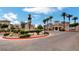 Community entrance with water feature, desert landscaping, and beautiful tile street at 10550 W Alexander Rd # 2220, Las Vegas, NV 89129