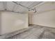 Attached garage with concrete flooring at 10550 W Alexander Rd # 2220, Las Vegas, NV 89129