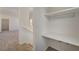 Hallway featuring carpet flooring and a built-in desk at 10550 W Alexander Rd # 2220, Las Vegas, NV 89129