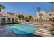 View of the community pool featuring ample lounge seating and mountain views at 10550 W Alexander Rd # 2220, Las Vegas, NV 89129