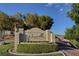 Chateau Versailles community sign with lush landscaping at 10550 W Alexander Rd # 2220, Las Vegas, NV 89129