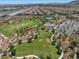 Overhead shot of neighborhood park with walking paths, tennis courts, and open green spaces at 11239 Cactus Tower Ave # 102, Las Vegas, NV 89135