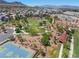 Aerial view of community park with a basketball court and walking paths at 11239 Cactus Tower Ave # 102, Las Vegas, NV 89135