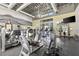 Large fitness center with machines, weights, mirrors, and television at 11239 Cactus Tower Ave # 102, Las Vegas, NV 89135