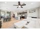 Bright living area boasts an open floor plan seamlessly connecting kitchen, dining area, and living space, perfect for modern living at 11239 Cactus Tower Ave # 102, Las Vegas, NV 89135