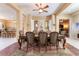 Formal dining area featuring a large table and direct access to the kitchen at 12276 Caminita Pl, Las Vegas, NV 89138