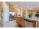 Spacious kitchen island with modern appliances and plenty of counter space at 12276 Caminita Pl, Las Vegas, NV 89138