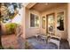 Cozy outdoor patio with seating area, ideal for relaxing and enjoying the fresh air in a private setting at 12276 Caminita Pl, Las Vegas, NV 89138