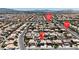 Extensive aerial shot of a neighborhood highlighting uniform housing styles and community planning at 1877 Glory Lily Ct, Las Vegas, NV 89123