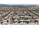 Panoramic aerial view of a residential community featuring similar houses and orderly street layouts at 1877 Glory Lily Ct, Las Vegas, NV 89123