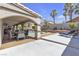 Inviting backyard featuring a covered patio, swimming pool, and lounge chairs perfect for relaxing at 1877 Glory Lily Ct, Las Vegas, NV 89123