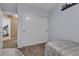 Bedroom with a sliding door closet and a view into another room at 1877 Glory Lily Ct, Las Vegas, NV 89123