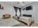 Bedroom featuring two twin beds and a wall-mounted TV at 1877 Glory Lily Ct, Las Vegas, NV 89123
