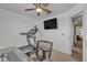 Office space with treadmill, desk, and a ceiling fan at 1877 Glory Lily Ct, Las Vegas, NV 89123