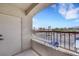 Balcony with stucco frame and view of the neighborhood below at 1881 W Alexander Rd # 2093, North Las Vegas, NV 89032