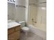 Bright bathroom features a tub and shower combination with tile flooring and a neutral color palette at 1881 W Alexander Rd # 2093, North Las Vegas, NV 89032