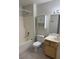 Well-lit bathroom featuring a vanity and a combination shower and tub at 1881 W Alexander Rd # 2093, North Las Vegas, NV 89032