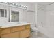 Well-lit bathroom with a single sink vanity, a bathtub/shower combo, and tile floors at 1881 W Alexander Rd # 2093, North Las Vegas, NV 89032